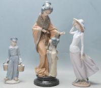 THREE VINTAGE LATE 20TH CENTURY PORCELAIN FIGURINES BY LLADRO AND NAO