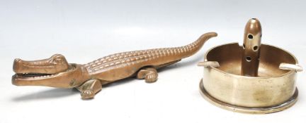 LARGE BRASS CROCODILE NUT CRACKER AND A LARGE WWII TRENCH ART ASHTRAY