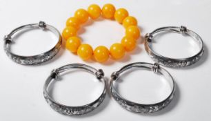 CHINESE WHITE METAL BRACELETS