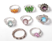 COLLECTION OF 8 STAMPED .925 SILVER RINGS