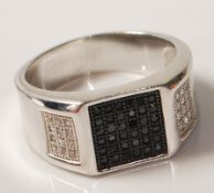 GENTLEMAN'S SILVER BLACK AND WHITE STONE RING
