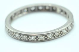 VINTAGE 18CT WHITE GOLD AND DIAMOND ETERNITY RING