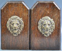 PAIR OF 19TH CENTURY OAK ARTS AND CRAFTS LION FACE BOOKENDS