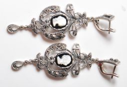 PAIR OF RENAISSANCE STYLE WHITE METAL EARRINGS