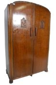 EARLY 20TH CENTURY DARK OAK FITTED DOUBLE WARDROBE