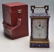 FRENCH BRASS AND ENAMEL CARRIAGE CLOCK WITH BOX AND KEY