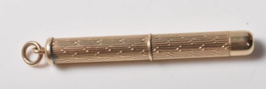 1970'S 9CT GOLD ENGINE TURNED TOOTHPICK