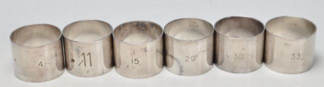 GOUP OF SIX 1920’S W.D. - WAR DEPARTMENT SILVER PLATED NAPKIN RINGS