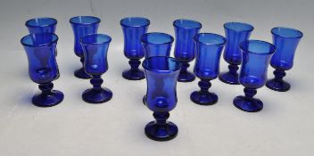 TWELVE HAND BLOWN BRISTOL BLUE WINE GLASSES