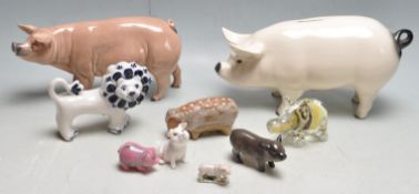 COLLECTION OF CHINA POTTERY AND GLASS PIG FIGURINE ORNAMENTS