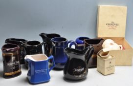 LARGE COLLECTION OF VINTAGE PROMOTIONAL ADVERTISING CERAMIC WHISKY JUGS