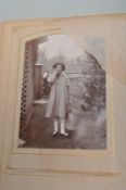 EARLY 20TH CENTURY BLACK AND WHITE FAMILY PHOTO ALBUM