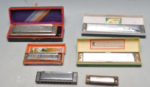 SEVEN MID CENTURY AND LATER HARMONICA MUSICAL INSTRUMENTS