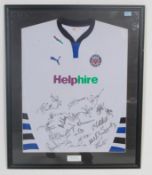 A signed and framed Bath Rugby shirt being well framed and presented bearing notation box for 1st