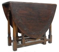 ANTIQUE STYLE JACOBEAN REVIVAL OAK DROP LEAF DINING TABLE