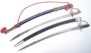 TWO EARLY 20TH CENTURY INDIAN CAVALRY SWORDS