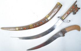 TWO MIDDLE EASTERN CEREMONIAL DAGGERS