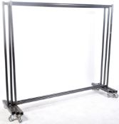 THREE LATE 20TH CENTURY SHOP DISPLAY CLOTHES RAILS