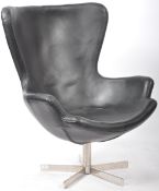 MID CENTURY BLACK LEATHERETTE UPHOLSTERED EGG CHAIR