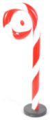 CONTEMPORARY FIBERGLASS MODEL OF A CANDY CANE