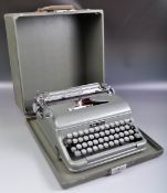 BLUE BIRD - VINTAGE GERMAN TYPEWRITER AND CASE