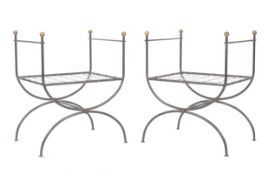 PAIR OF 20TH CENTURY POLISHED IRON AND BRASS CURUL