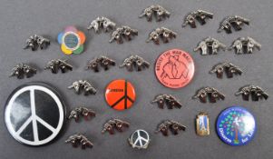 COLLECTION OF VINTAGE 190S ANTI-VIETNAM WAR BADGES