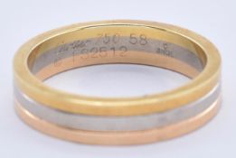 AN 18CT GOLD TRI COLOUR CARTIER BAND RING