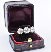 18CT WHITE GOLD AND DIAMOND THREE STONE RING