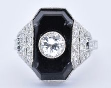 PLATINUM, ONYX AND DIAMOND ART DECO DRESS RING