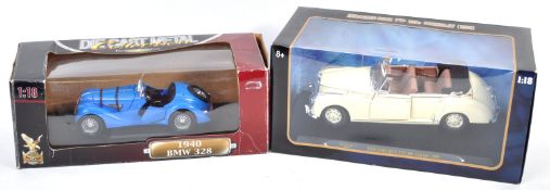 TWO BOXED 1/18 SCALE DIECAST MODEL CARS