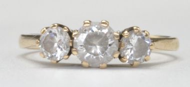 9CT GOLD AND THREE WHITE STONE RING