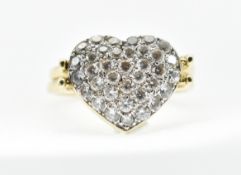 A 14CT GOLD AND DIAMOND METAMORPHIC HEART SWIVEL RING