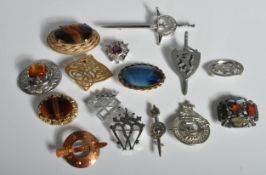FIFTEEN VINTAGE SCOTTISH STYLE BROOCHES