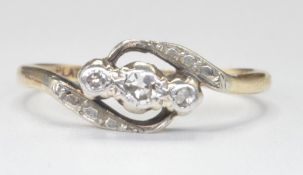 9CT GOLD AND DIAMOND CROSSOVER RING