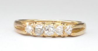 18CT GOLD AND DIAMOND FIVE STONE RING