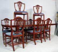 REGENCY STYLE MAHOGANY DINING TABLE AND CHAIRS