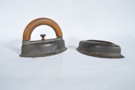 TWO ANTIQUE FLAT IRONS