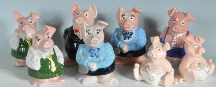EIGHT WADE NAT WEST CERAMIC PIGS