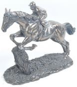 20TH CENTURY BRONZE EFFECT RESIN STATUE OF A HORSE & JOCKEY