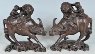 TWO CHINESE ORIENTAL HARDWOOD LUCKY WATER BUFFALOS