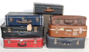 COLLECTION OF SEVEN VINTAGE MID 20TH CENTURY SUITCASES