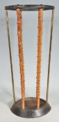ANTIQUE STYLE CAST IRON AND BAMBOO STIK STAND / UMBRELLA STAND