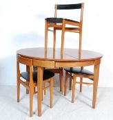 RETRO VINTAGE ROUNDETTE DINING TABLE AND CHAIRS IN THE MANNER OF FREM ROJLE