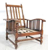 1930’S OAK FRAME FIRESIDE ARM CHAIR