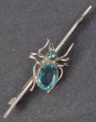 CHARLES HORNER ANTIQUE SILVER AND TOPAZ SPIDER BROOCH