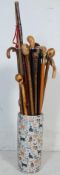 LARGE COLLECTION OF WOODEN WALKING STICKS