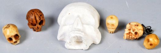 GROUP OF 19TH CENTURY MINIATURE CARVED SKULLS