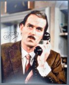 JOHN CLEESE - FAWLTY TOWERS - BASIL FAWLTY AUTOGRAPHED PHOTO