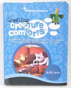 AARDMAN ANIMATIONS - CREATURE COMFORTS - DUAL SIGNED BOOK